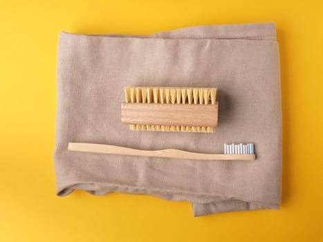 Plastic free toothbrush and hand washing brush, daily bath utensils,  renewable resources, zero waste concept, daily products.