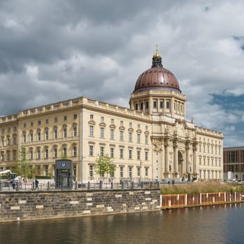 The completed Humboldt Forum in Berlin with the last remaining work on the footpath on the west side