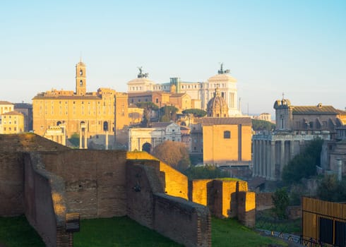 Ancient ruins of forum and Victor Emmanuel II monument in a winter day in Rome, Italy