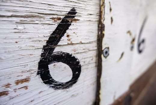Detail of even number of information in an old wood