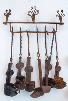 Old rusty iron oil lamps. Country style