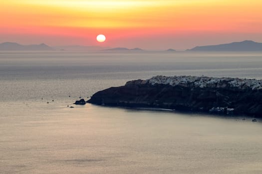 Sunset over Santorini as seen from Imerovigli. Cyclades, Greece