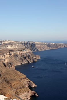 Panoramic view of the Santorini caldera cliffs from the Imerovigli village on Santorini island, Greece