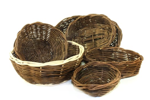 braided willow basket against a bright background
