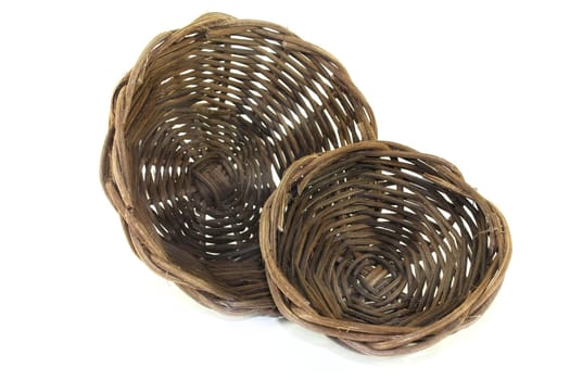 braided willow basket against a bright background