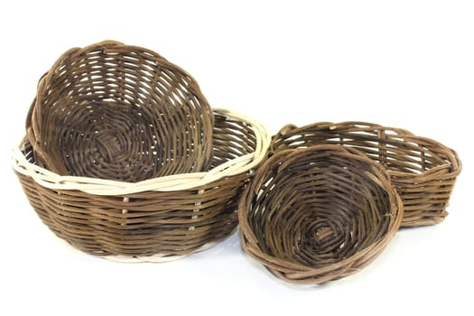 braided willow baskets against a bright background