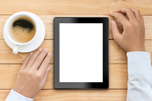 business man using tablet white screen display with coffee drink on wood desk