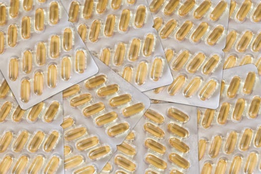 Background from blister packs with Omega 3 Gel capsules