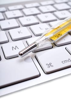 Macro recording Fever thermometer is located on keyboard