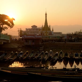 the Boat landing Pier at the Nan Chaung Main Canal in the city of Nyaungshwe at the Inle Lake in the Shan State in the east of Myanmar in Southeastasia.
