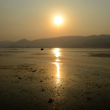 the Landscape at sunrise on the Inle Lake in the Shan State in the east of Myanmar in Southeastasia.