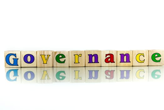 governance colorful wooden word block on the white background