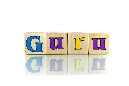 guru colorful wooden word block on the white background