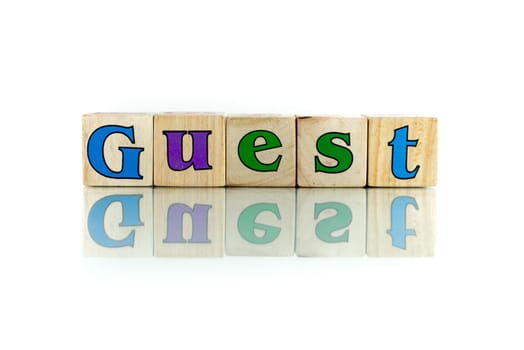 guest colorful wooden word block on the white background
