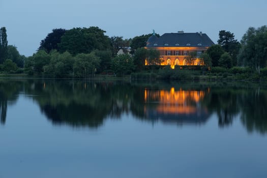 Illuminated Villa Kampffmeyer on the banks of the Havel at Glienicker Horn