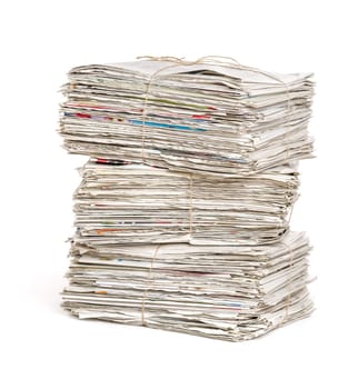 Stacked bundles of newspapers