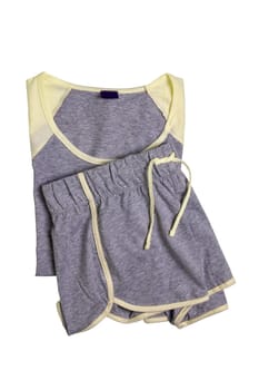 Closeup of gray yellow female sexy nightwear summer set of shorts and a top or shirt isolated on a white background. Clipping path. Fashionable night wear or nighties.