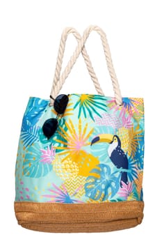 Colorful beach bag isolated on a white background. Clipping path. Summer holidays, vacation and travel concept. Beach handbag for travel.