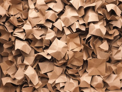 Eco friendly packaging material made of recycled waste paper to protect the goods against damage using as background or header, environmental protection, reuse materials