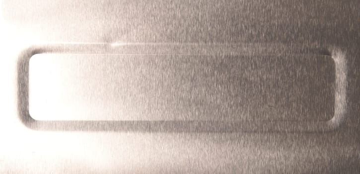Texture of an aluminum plate using as header or background, metal backdrop, space for text