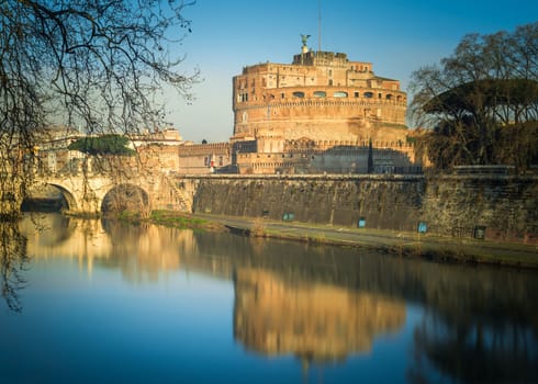 Saint Angel Castle and bridge over the Tiber river in Rome, Italy