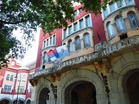 Subotica, Serbia, September 12 2021 City Hall of Subotica szabadka in Hungarian Art Nouveau style, Vojvodina, the former territory of Austria-Hungary. People visit tourist attractions on a summer day.