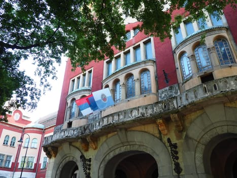 Subotica, Serbia, September 12 2021 City Hall of Subotica szabadka in Hungarian Art Nouveau style, Vojvodina, the former territory of Austria-Hungary. People visit tourist attractions on a summer day.