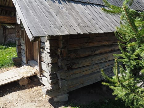 Log village farmhouse. 19th century Bosnian mountain traditional dwelling. Restored ethno building. The old way of village life. House of the witch in the woods.