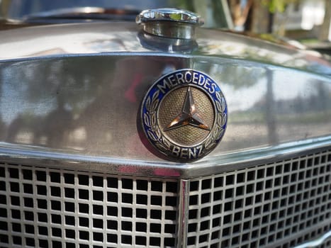 Stanisici, Bijelina, Bosnia and Herzegovina, April 25, 2021. Mercedes Benz pontoon, retro car. Cover of the engine compartment of the car. Part of the body with a metal grille from the engine