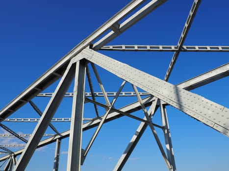 The bridge on the river Sava. Part of the construction of the metal iron bridge. Modern technological beams.