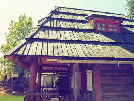 Stanisici, Bijelina, Bosnia and Herzegovina, 25 April 2021. Log village farmhouse. 19th century Bosnian mountain traditional dwelling. Restored ethno building. The old way of village life.