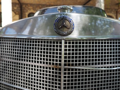 Stanisici, Bijelina, Bosnia and Herzegovina, April 25, 2021. Mercedes Benz pontoon, retro car. Cover of the engine compartment of the car. Part of the body with a metal grille from the engine