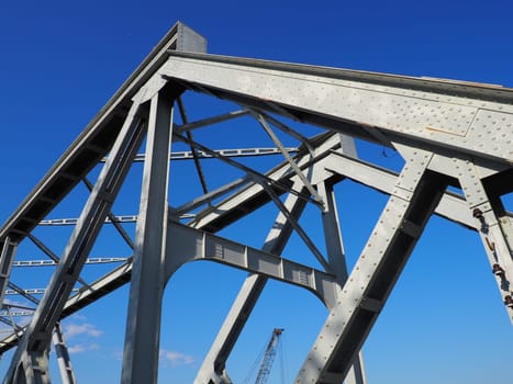 The bridge on the river Sava. Part of the construction of the metal iron bridge. Modern technological beams.