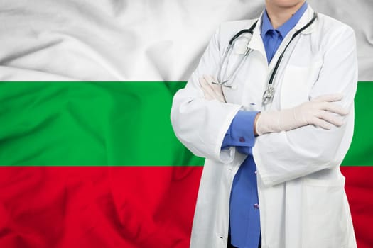 Doctor standing with the flag