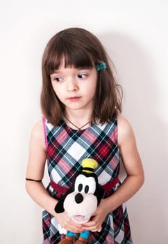 Child girl with the toy