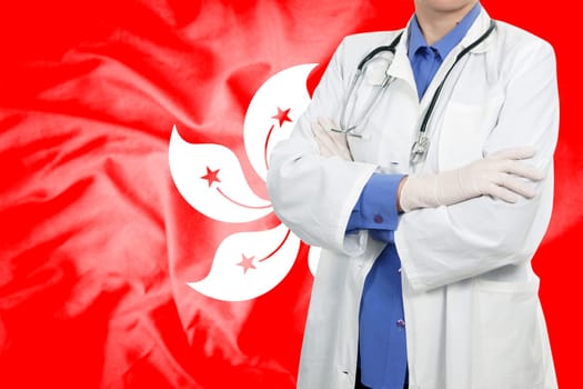 Doctor standing with the flag