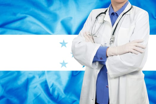 Doctor standing with the flag