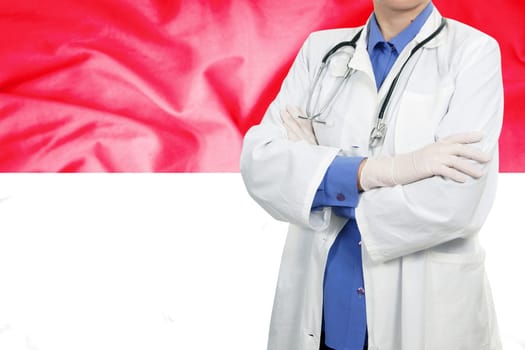 Doctor standing with the flag