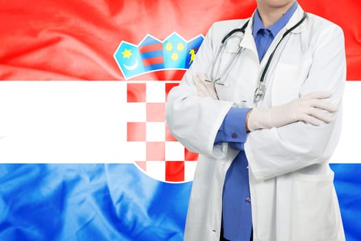 Doctor standing with the flag
