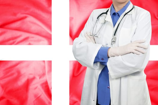 Doctor standing with the flag