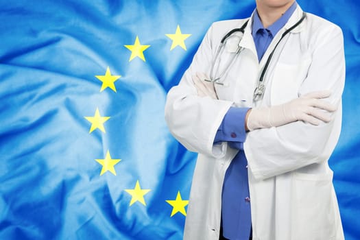 Doctor standing with the flag