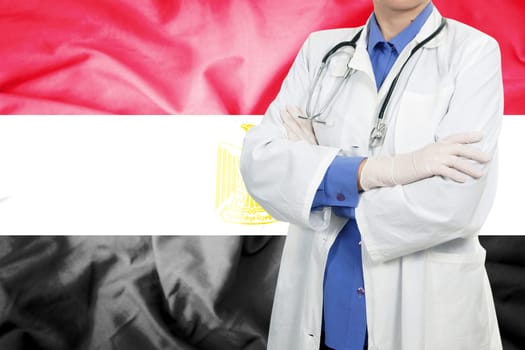 Doctor standing with the flag