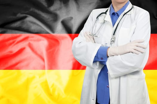 Doctor standing with the flag