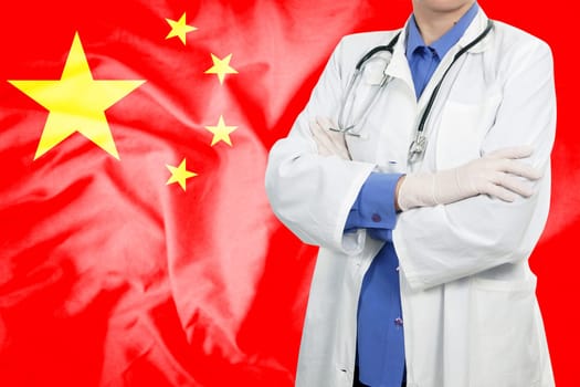 Doctor standing with the flag
