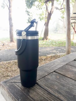 Reusable steel thermal water cup, stock photo