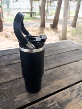 Reusable steel thermal water cup, stock photo
