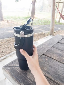 Reusable steel thermal water cup, stock photo