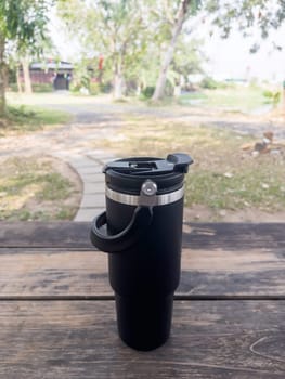 Reusable steel thermal water cup, stock photo