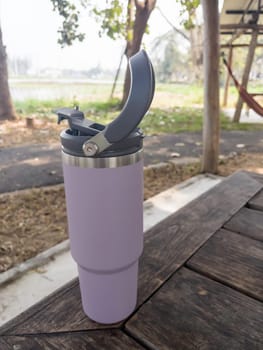 Reusable steel thermal water cup, stock photo