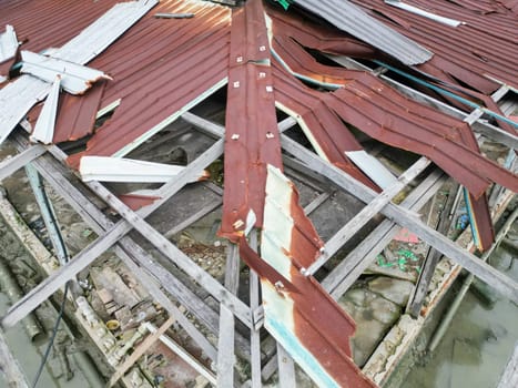 Aerial top down view the old broken zinc cover at building